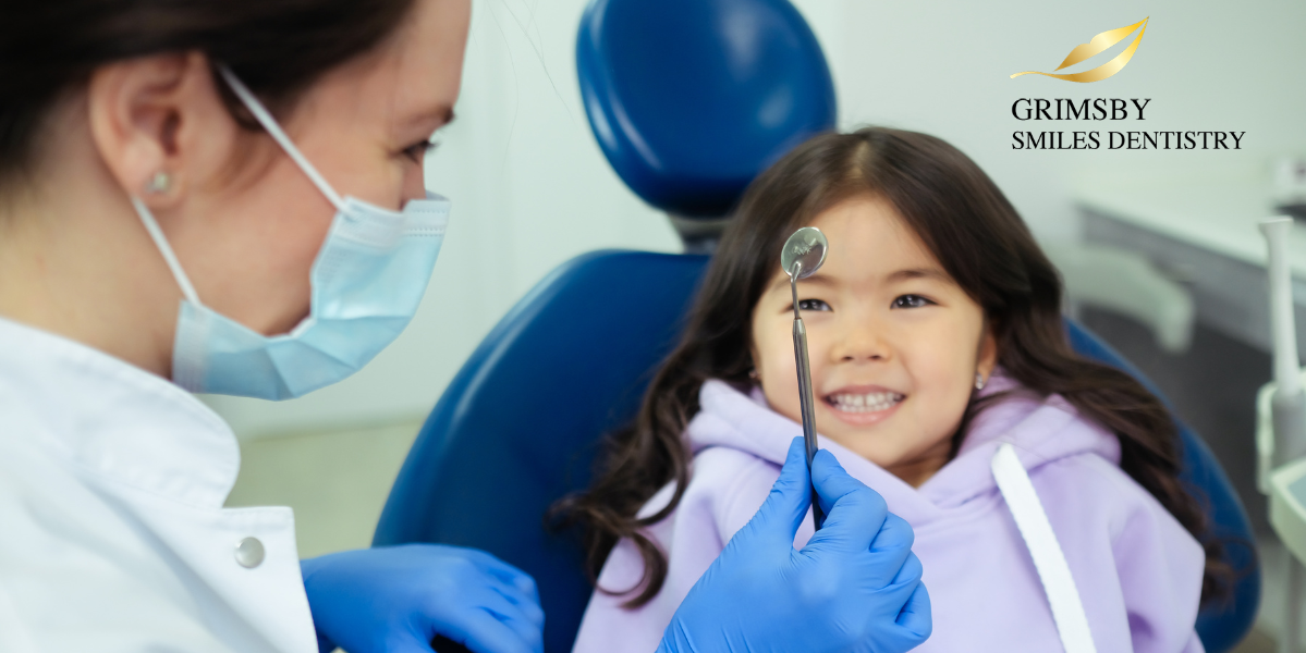 Family dentist at Grimsby Smiles Dentistry helping young patient overcome dental anxiety 